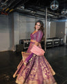 Exquisite purple and gold bridal lehenga, a perfect blend of tradition and style.