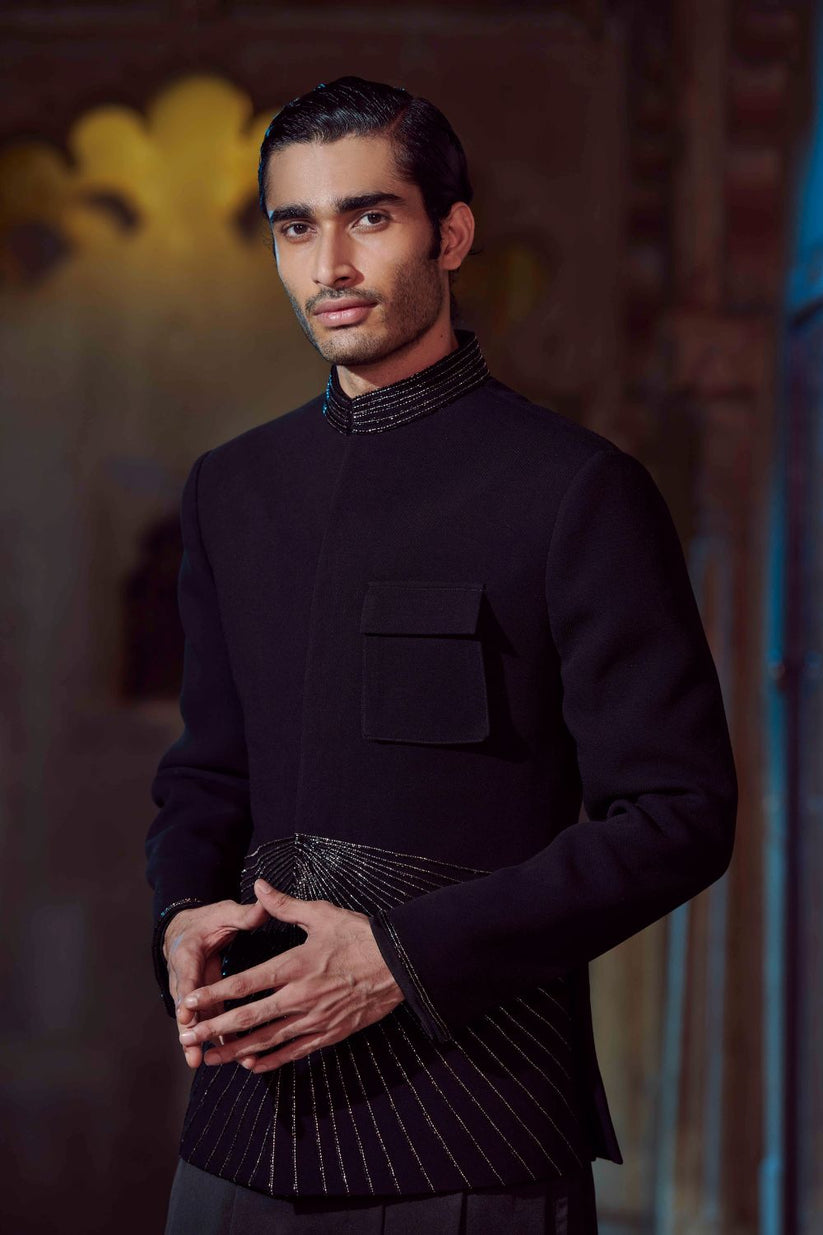 Sophisticated black V-shaped kurta with subtle beadwork