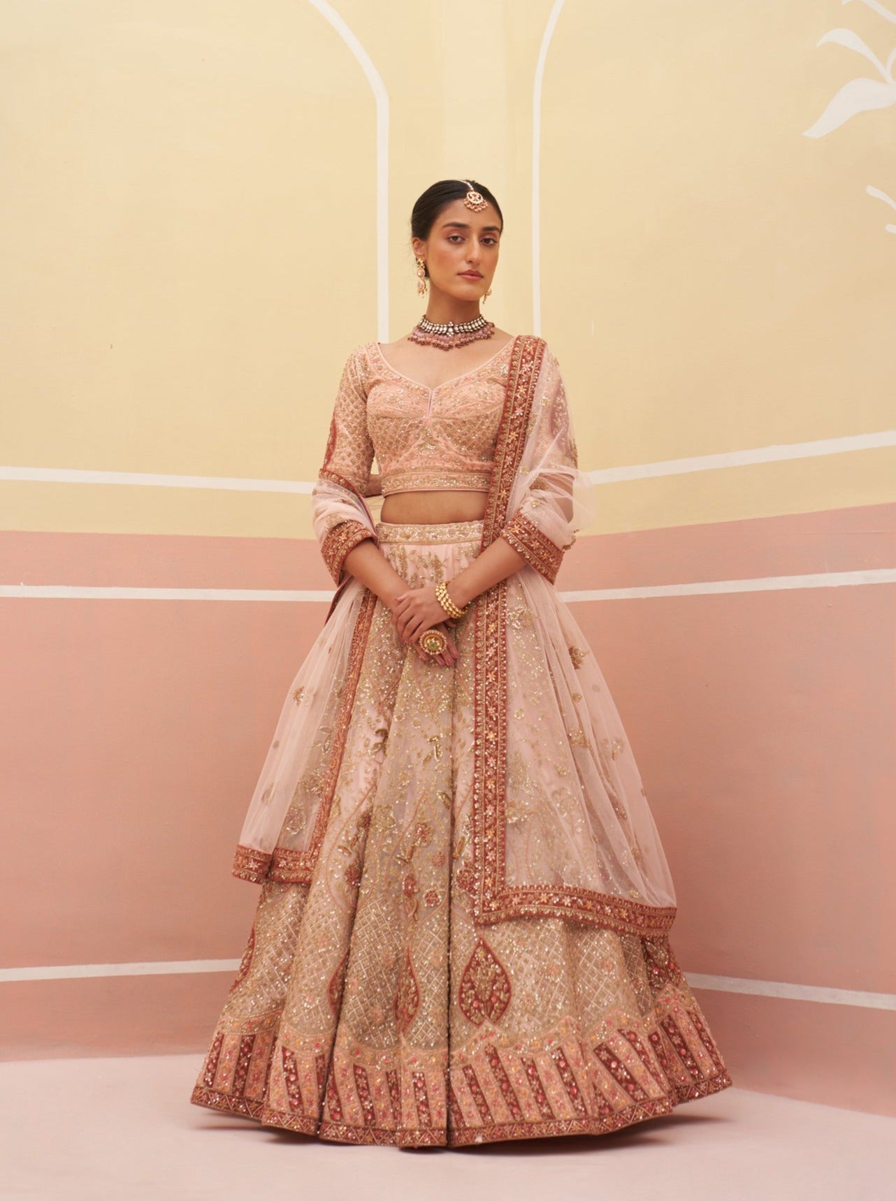 Photo of Dirty peach lehenga with red jewellery | Peach lehenga, Peach  clothes, Lehenga