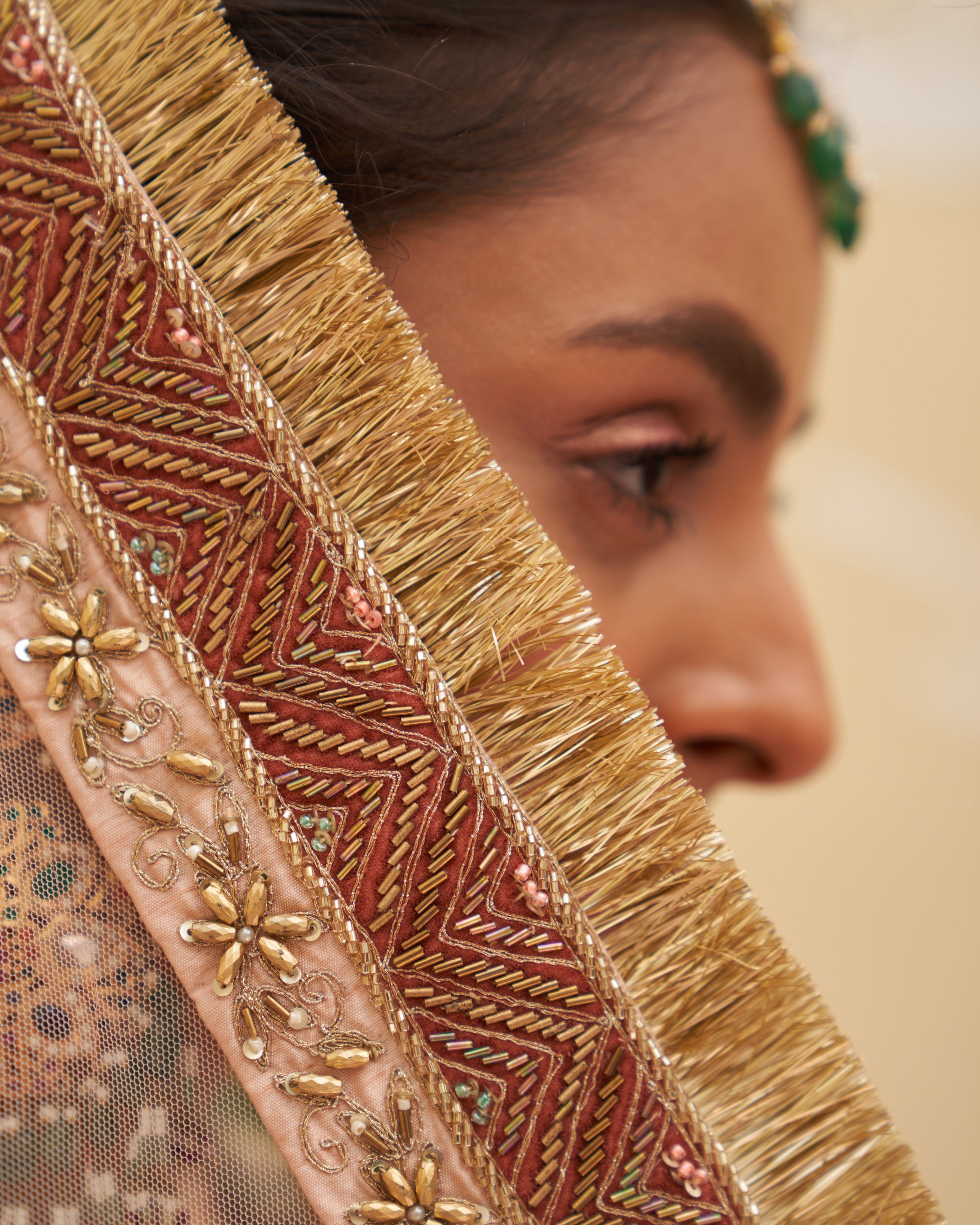 Charming peach raw silk lehenga set featuring delicate beadwork