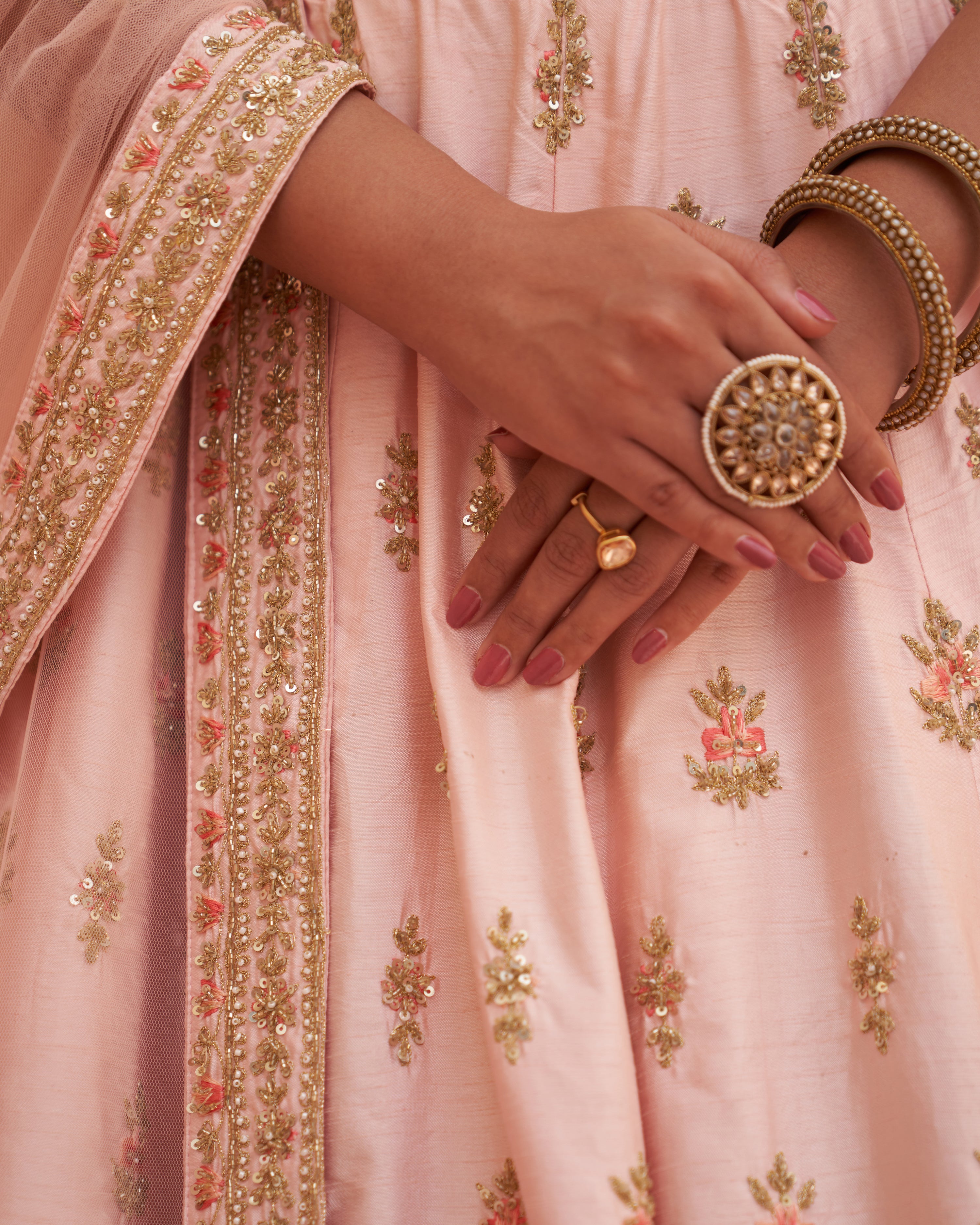 Radiant pink raw silk lehenga set with intricate sequin detailing