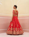 Chic Red Raw Silk Lehenga Set Featuring Traditional Motifs