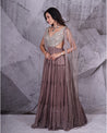 Draped in the timeless allure of grey, this anarkali whispers tales of elegance with every sway. 