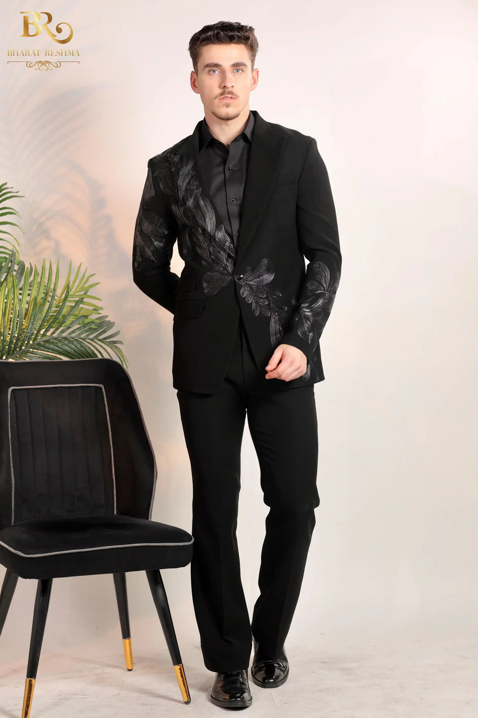 Black-colored_suit_with_Black_Resham_embroidery_1.webp