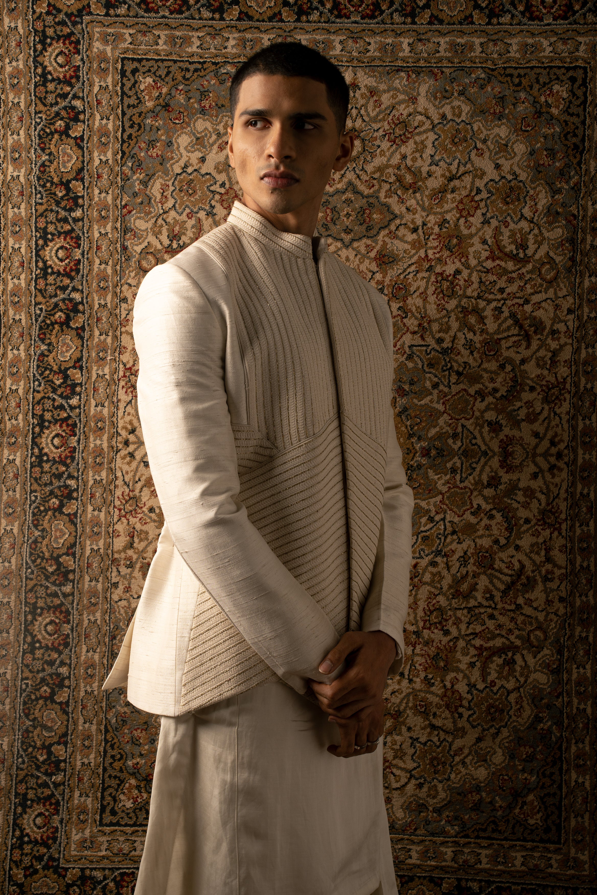 Unleash your inner sophistication: Embrace the allure of Ivory with this Rawsilk Jacket, Silk Kurta, and Linen Satin Pants ensemble, a symbol of timeless elegance.