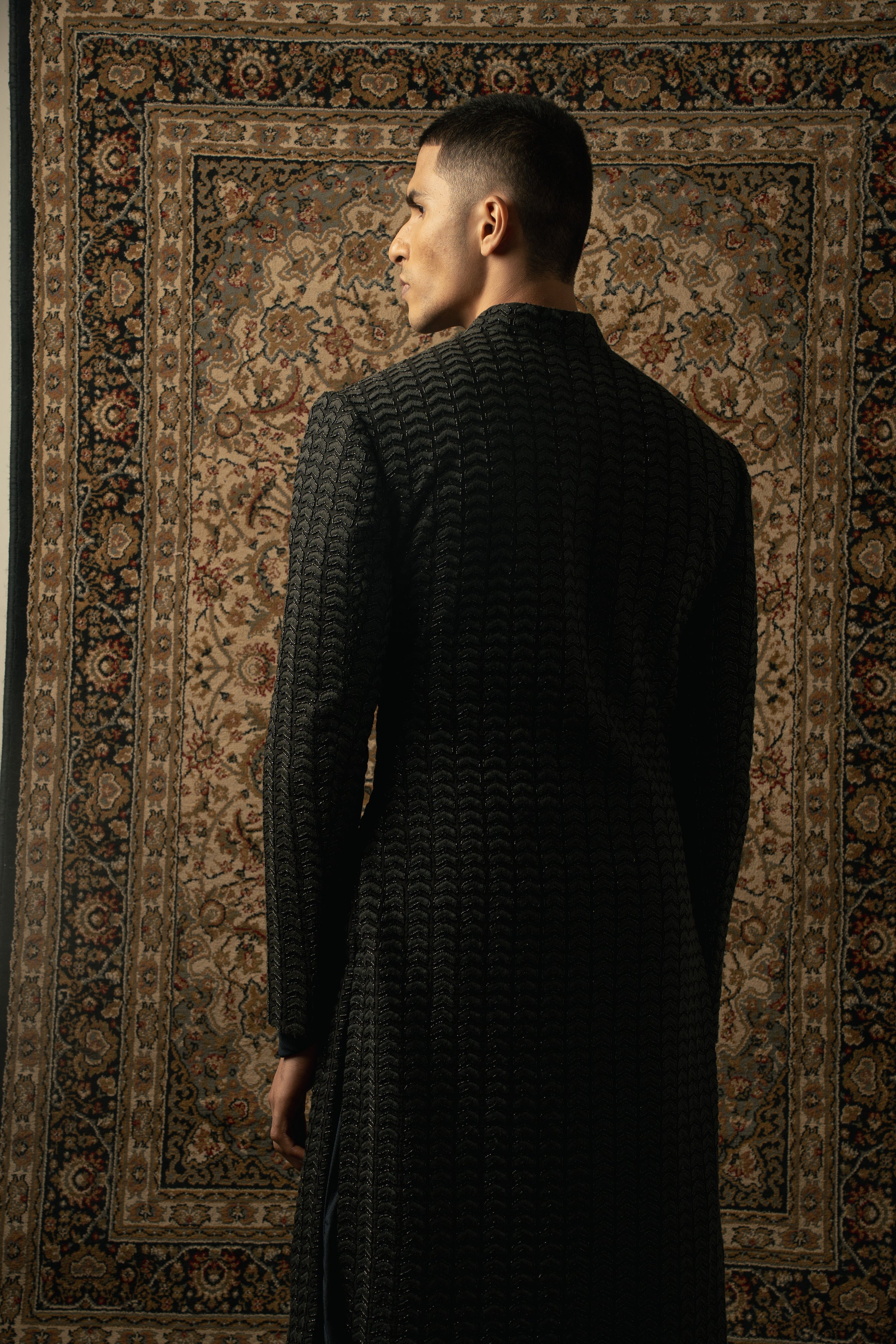 Embrace the allure of black: Step into the spotlight with this Silk Sherwani, paired effortlessly with Spandex Kurta and Pants for a refined look.