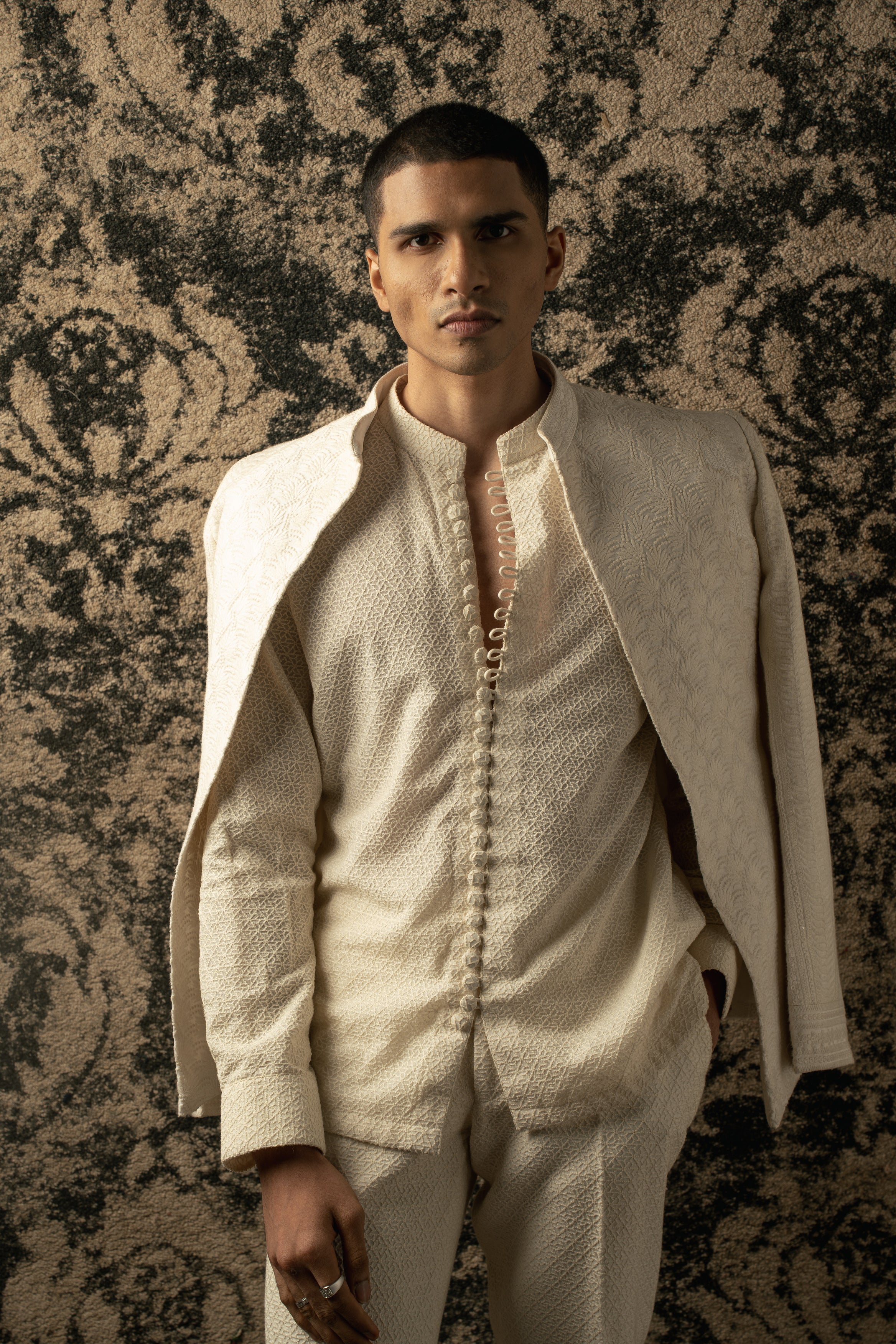 Radiant in Ivory: Silk Jacket combined with Georgette Shirt Kurta and Pants, a symbol of refined style and understated elegance.