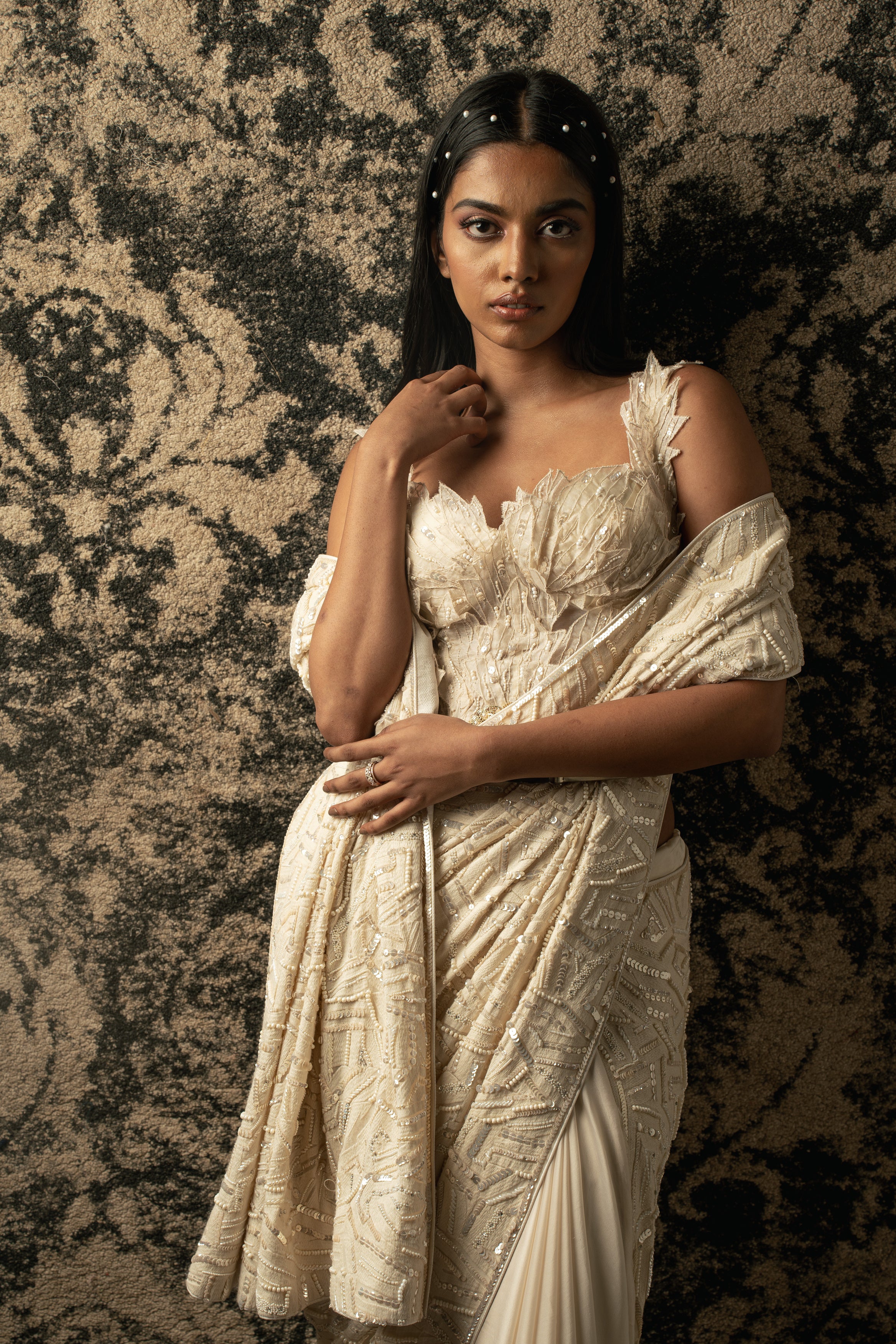 Indulge in opulence: Ivory Silk Satin and Georgette Saree, complemented by a Net blouse and satin stretch petticoat, a vision of ethereal beauty and grace.