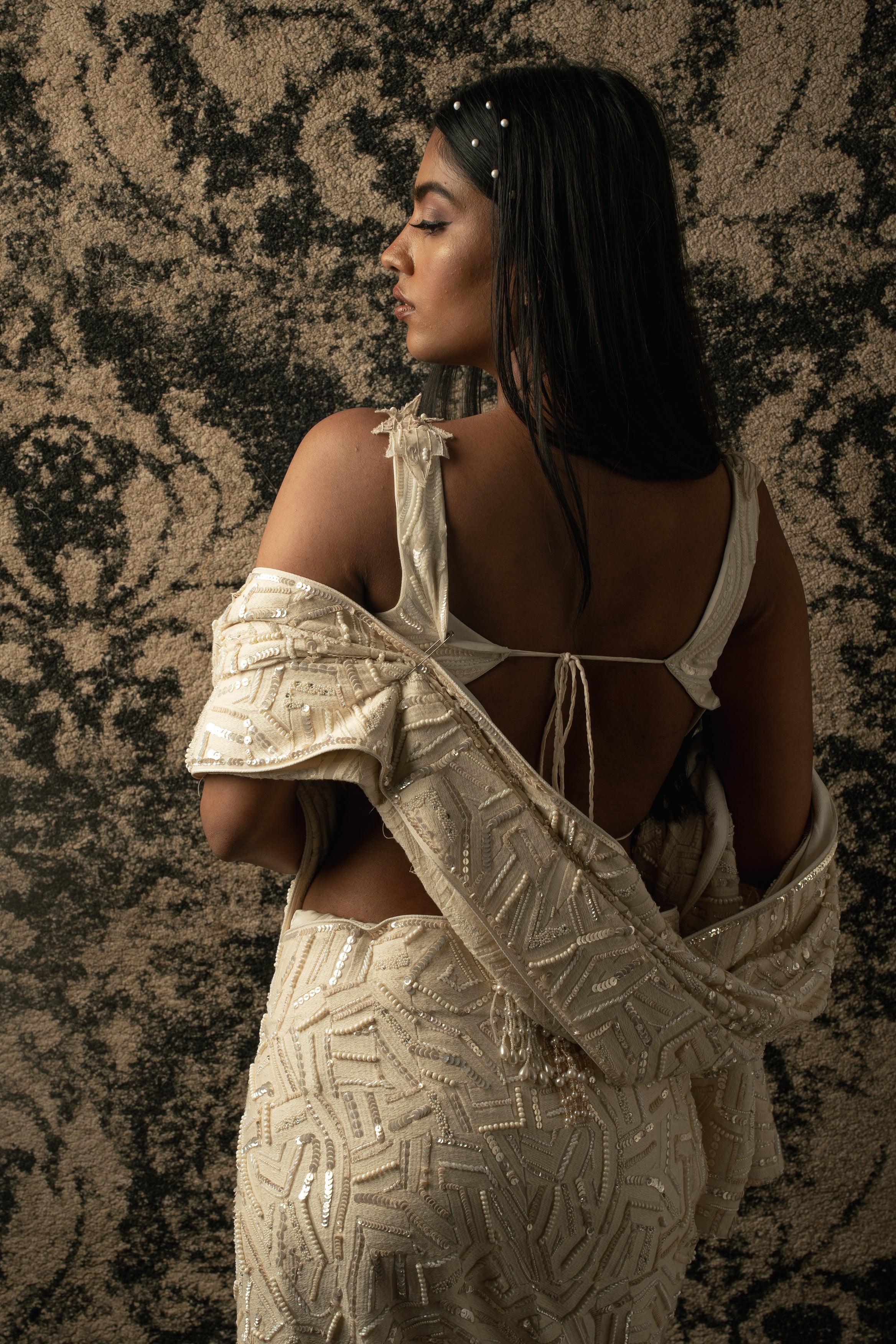 Radiant in Ivory: Drift into elegance with this Silk Satin and Georgette Saree, adorned with a Net blouse and satin stretch petticoat, a perfect blend of tradition and modernity.