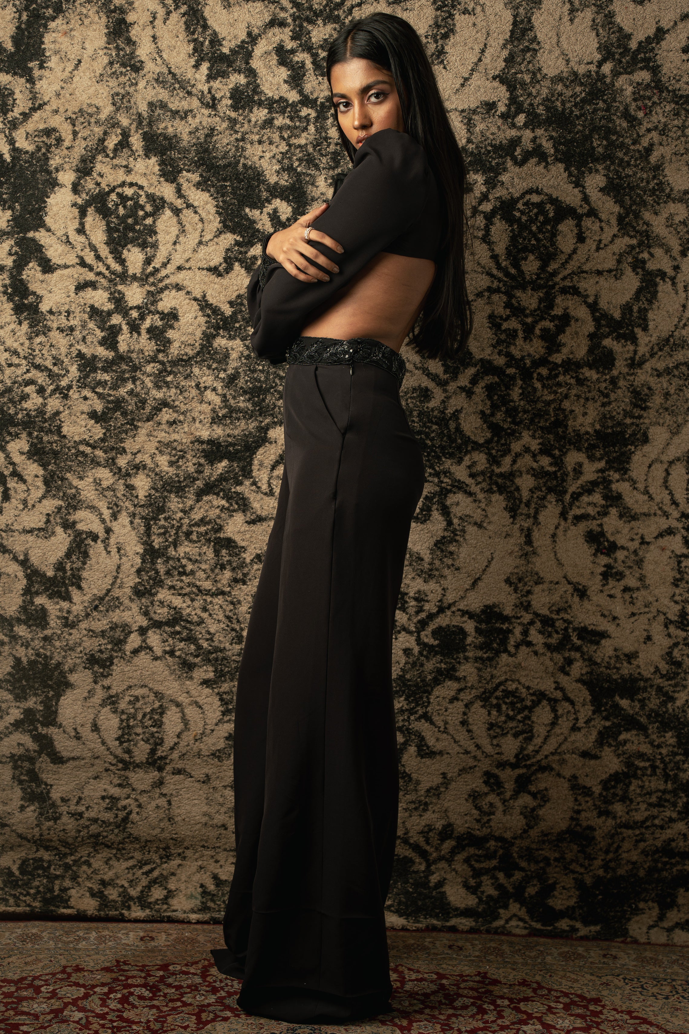 Make a statement in black: This jumpsuit exudes sophistication with its Italian suiting fabric and satin neck detailing