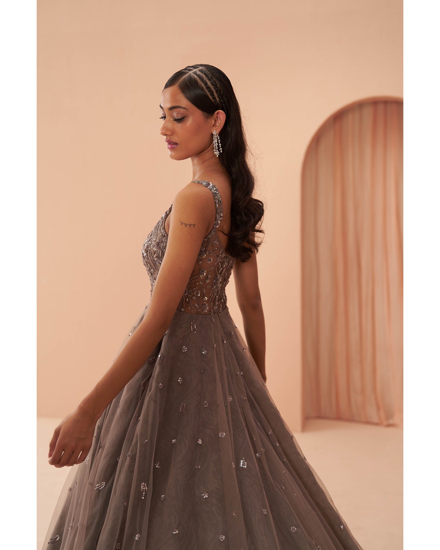 Grey Elegance: Hand-embroidered sophistication graces this gown, a vision of timeless charm.