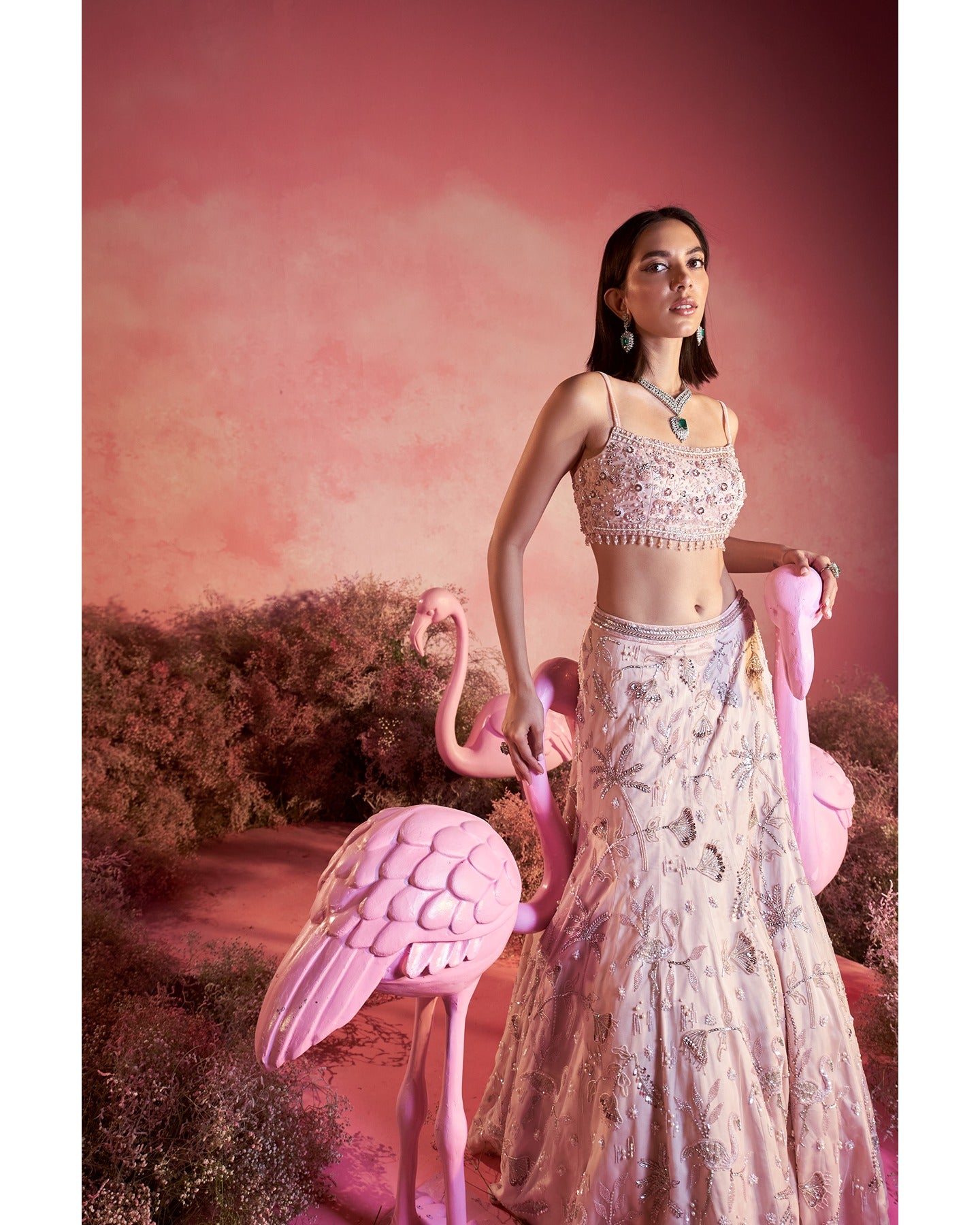 Dreamy in pink: This lehenga is a symphony of elegance, weaving a tale of timeless charm with every twirl. 