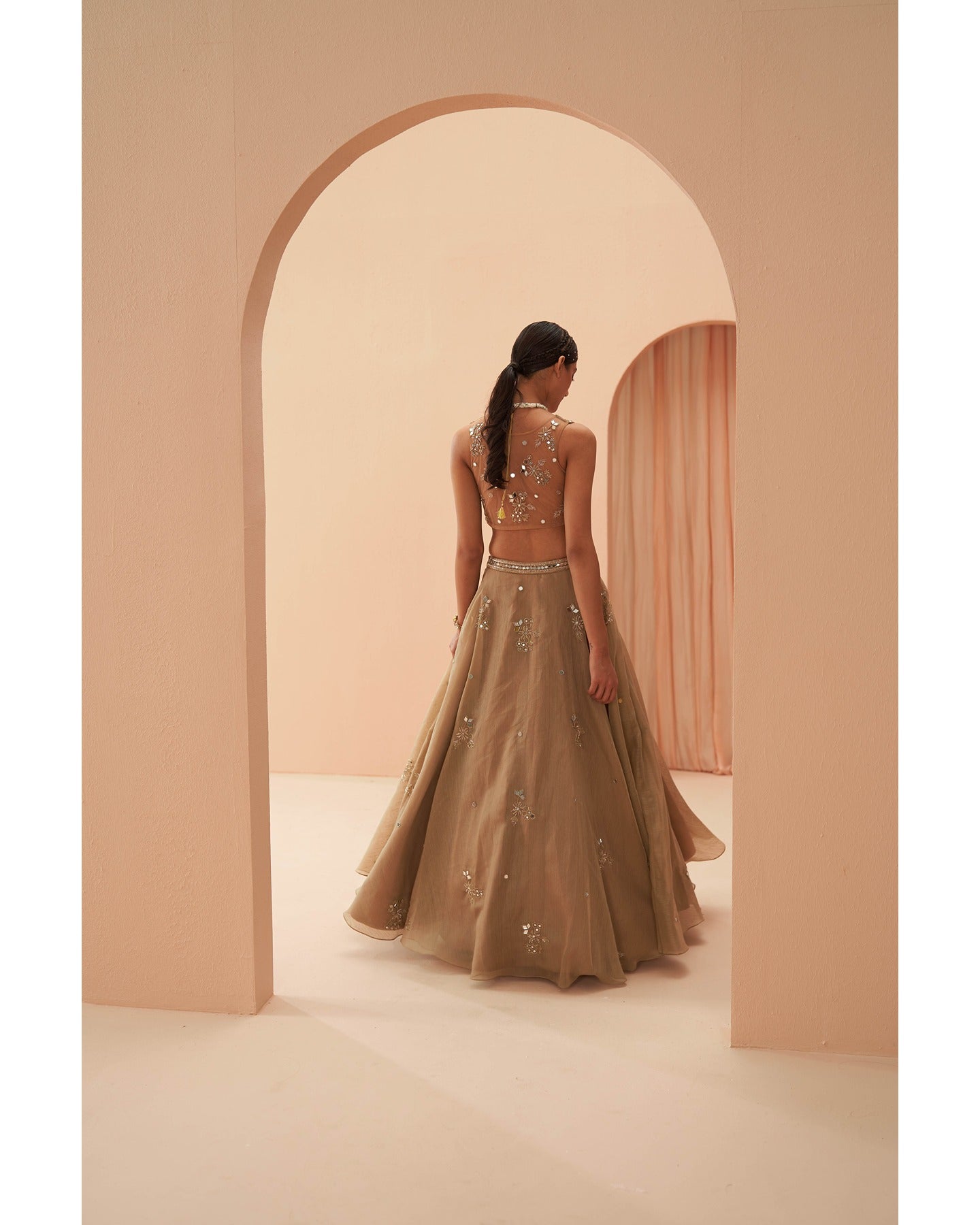 Glowing in Gold: This hand-embroidered golden lehenga is a masterpiece of elegance and craftsmanship. 