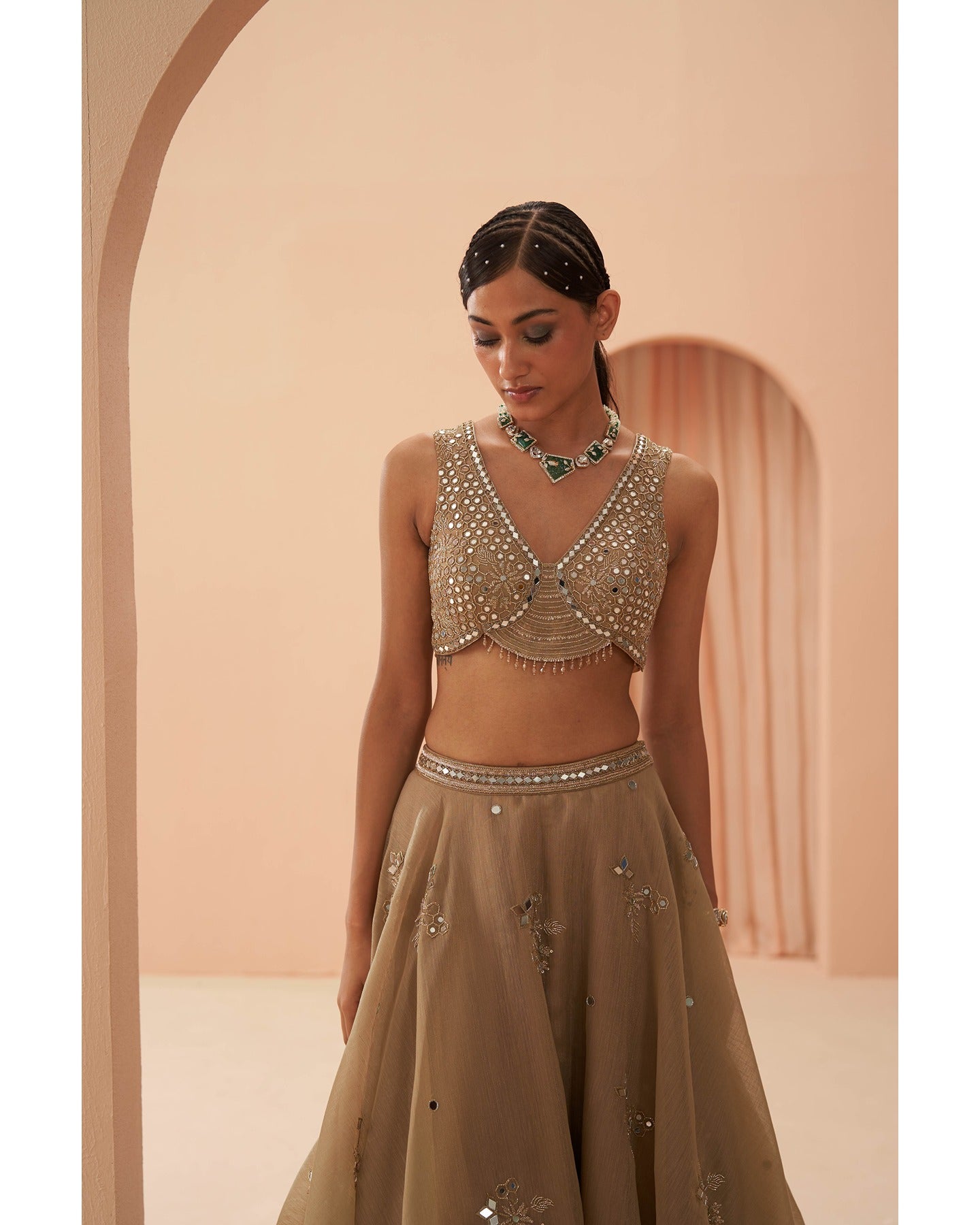 Glowing in Gold: This hand-embroidered golden lehenga is a masterpiece of elegance and craftsmanship. 