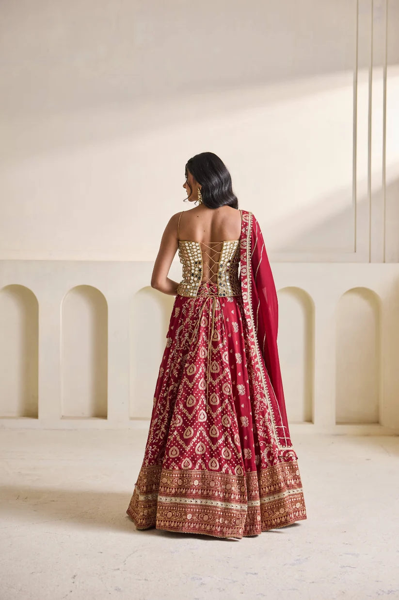 Gold embroidered corset and brocade lehenga set