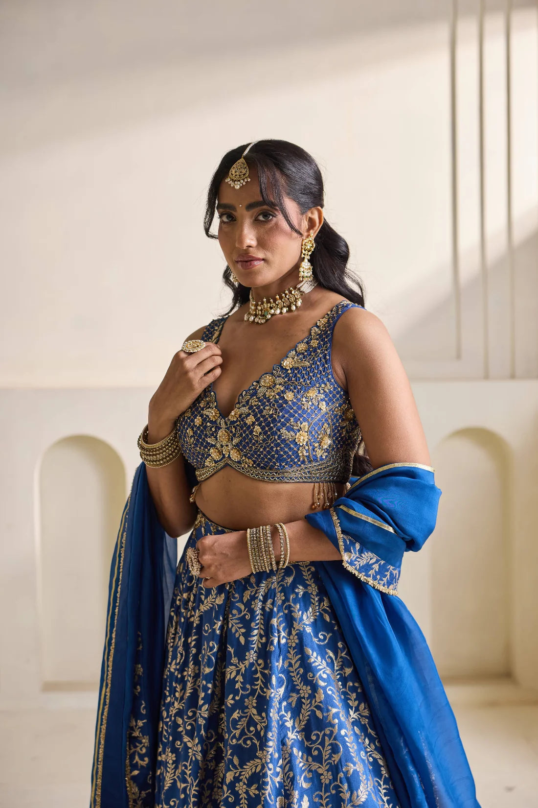 Deep blue embroidery blouse and Brocade lehnga set