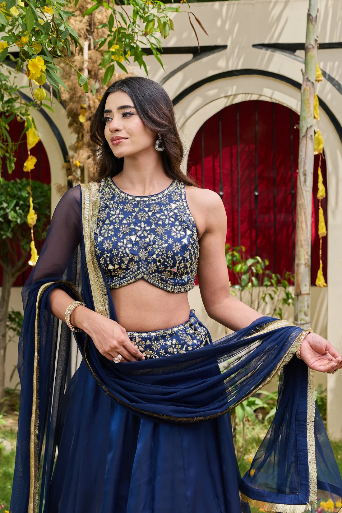 Navy blue blouse and shimmer organza lehnga set