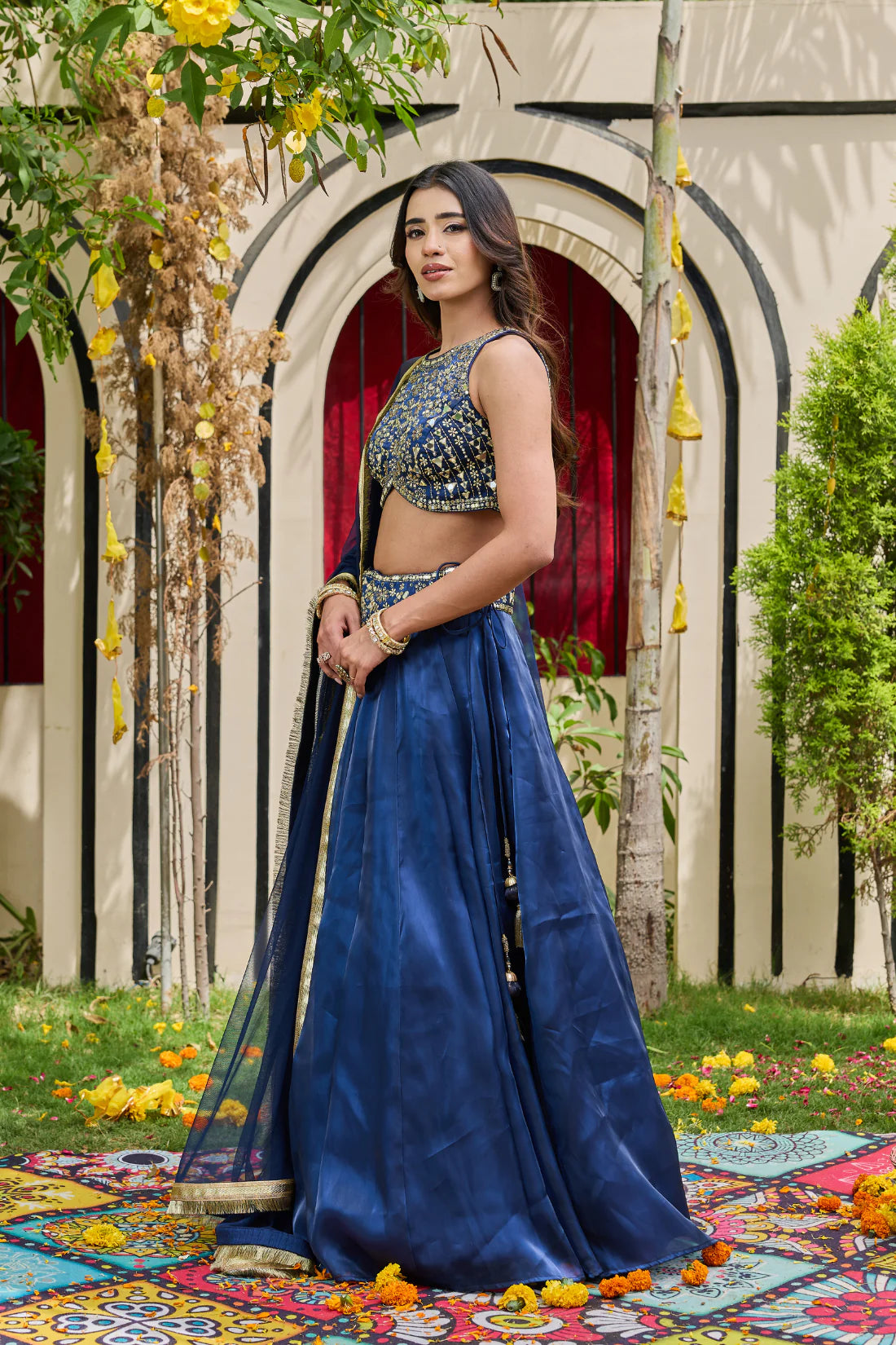 Navy blue blouse and shimmer organza lehenga set