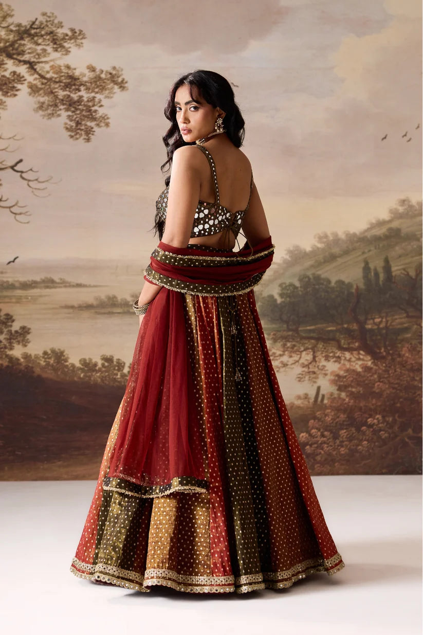 Olive green embroidered blouse and cosmos multipanel lehnga set
