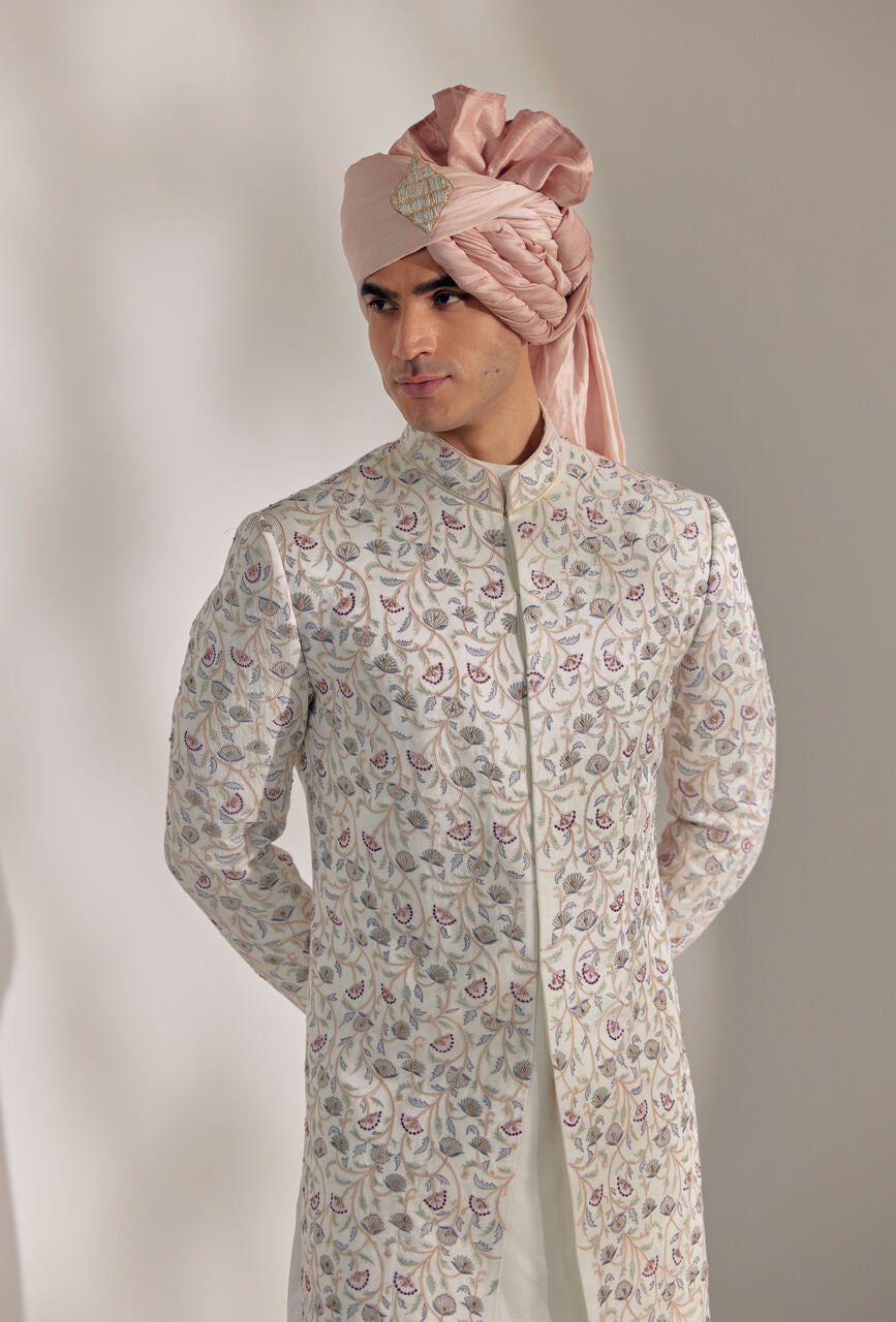 Step into timeless sophistication with the White Vine Sherwani