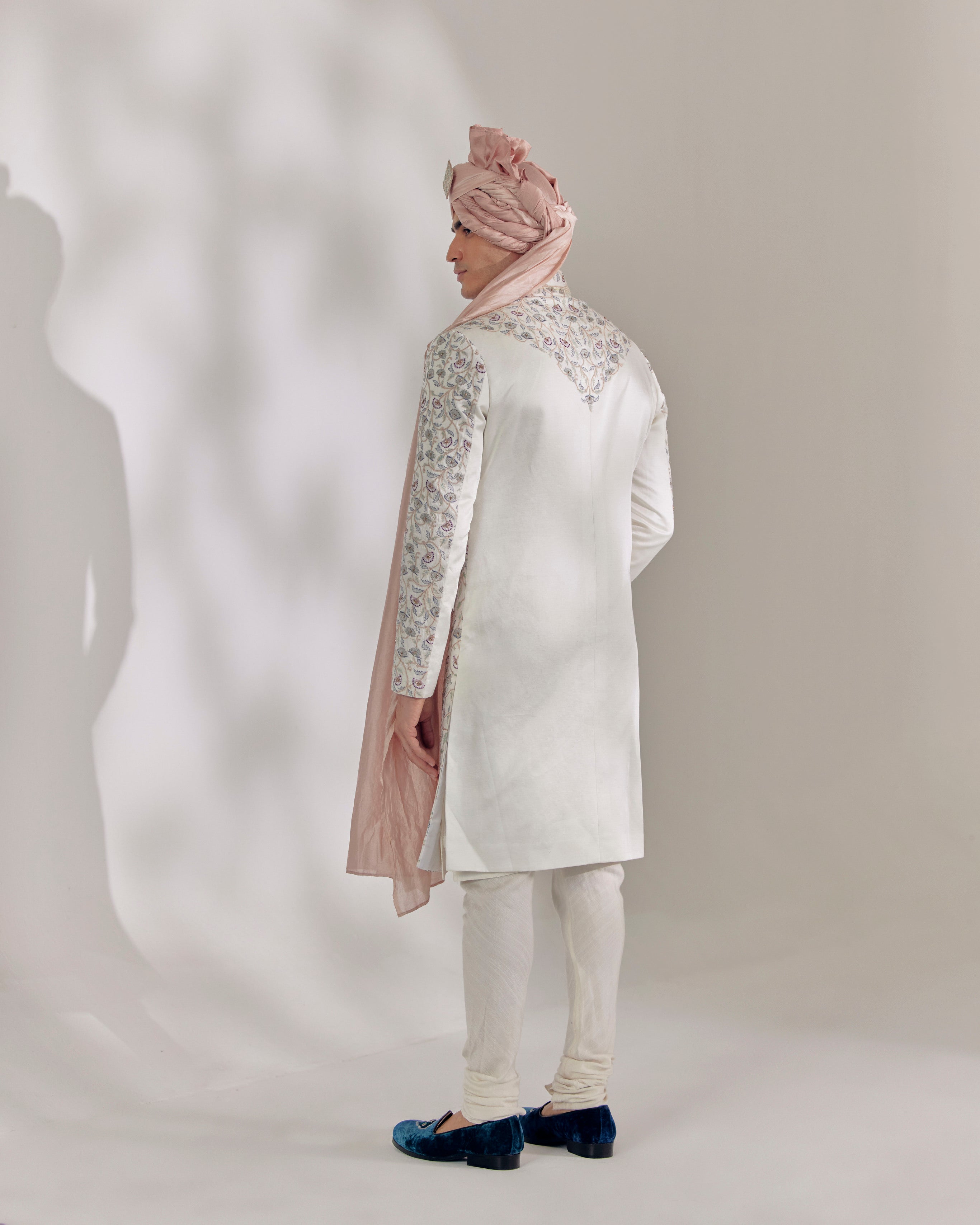 Step into sophistication with The Blond Affaire Sherwani Set.