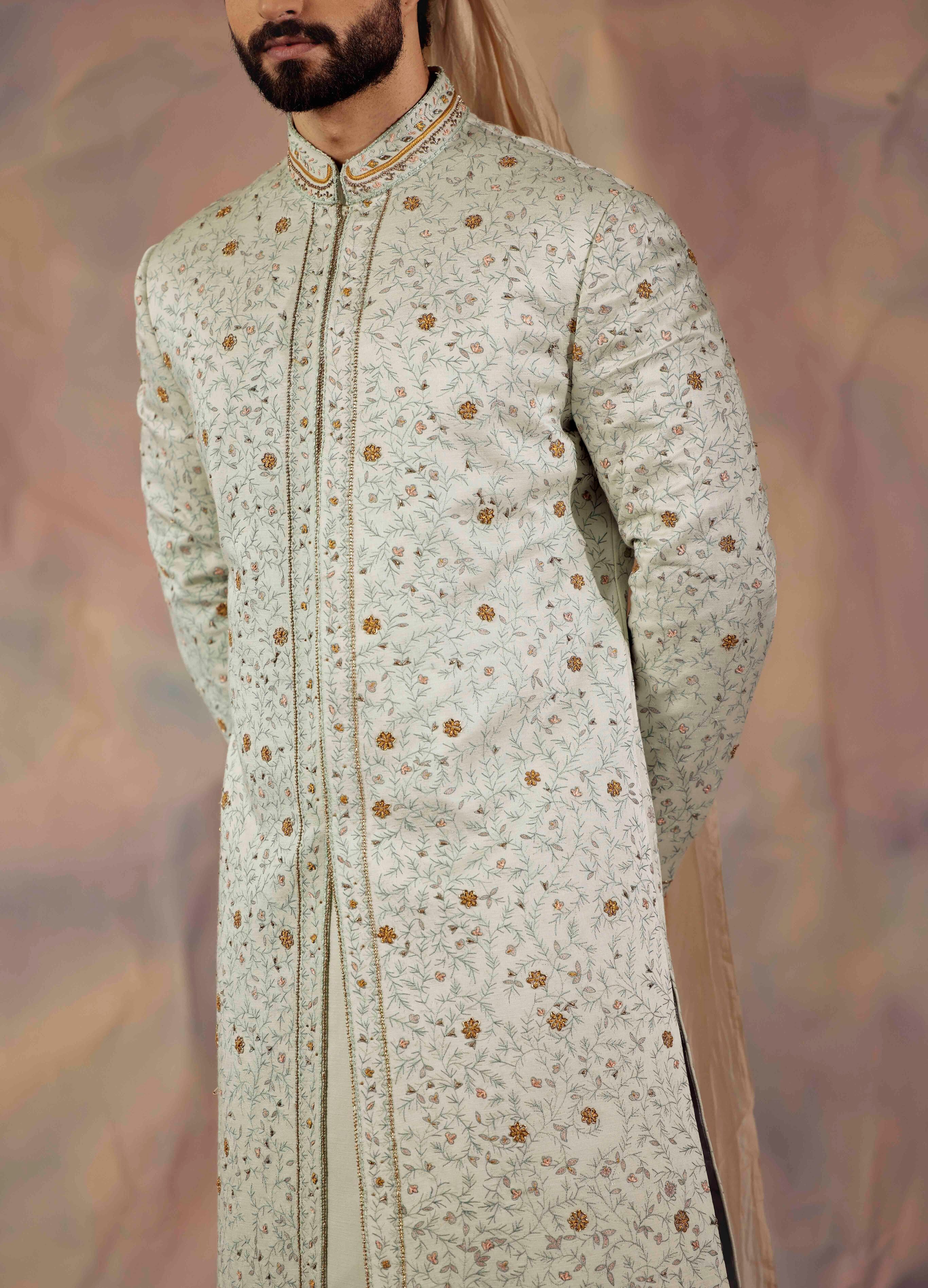 Step into regal elegance with the Silver Lining Sherwani Set