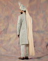 Unveil your royal charm with the Silver Lining Sherwani Set