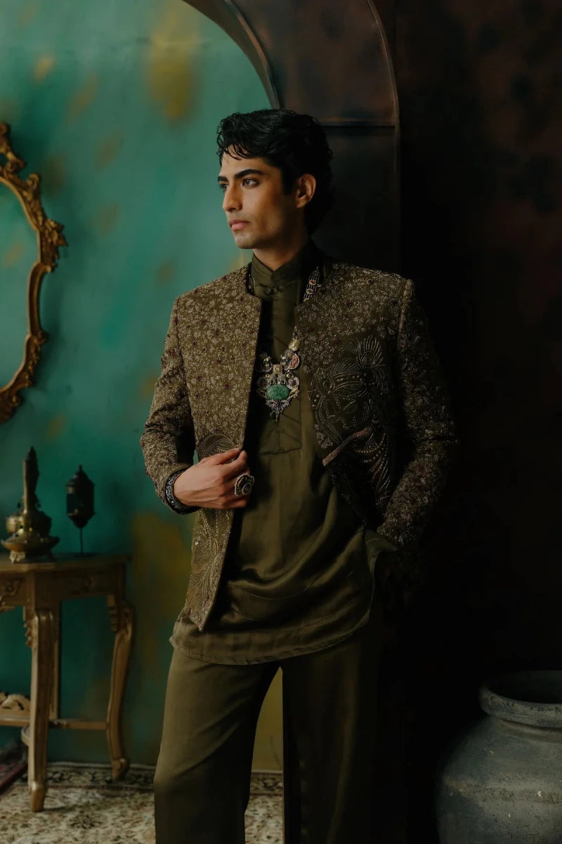 Olive hand embroidered silk short jacket set with radha krishna motif.