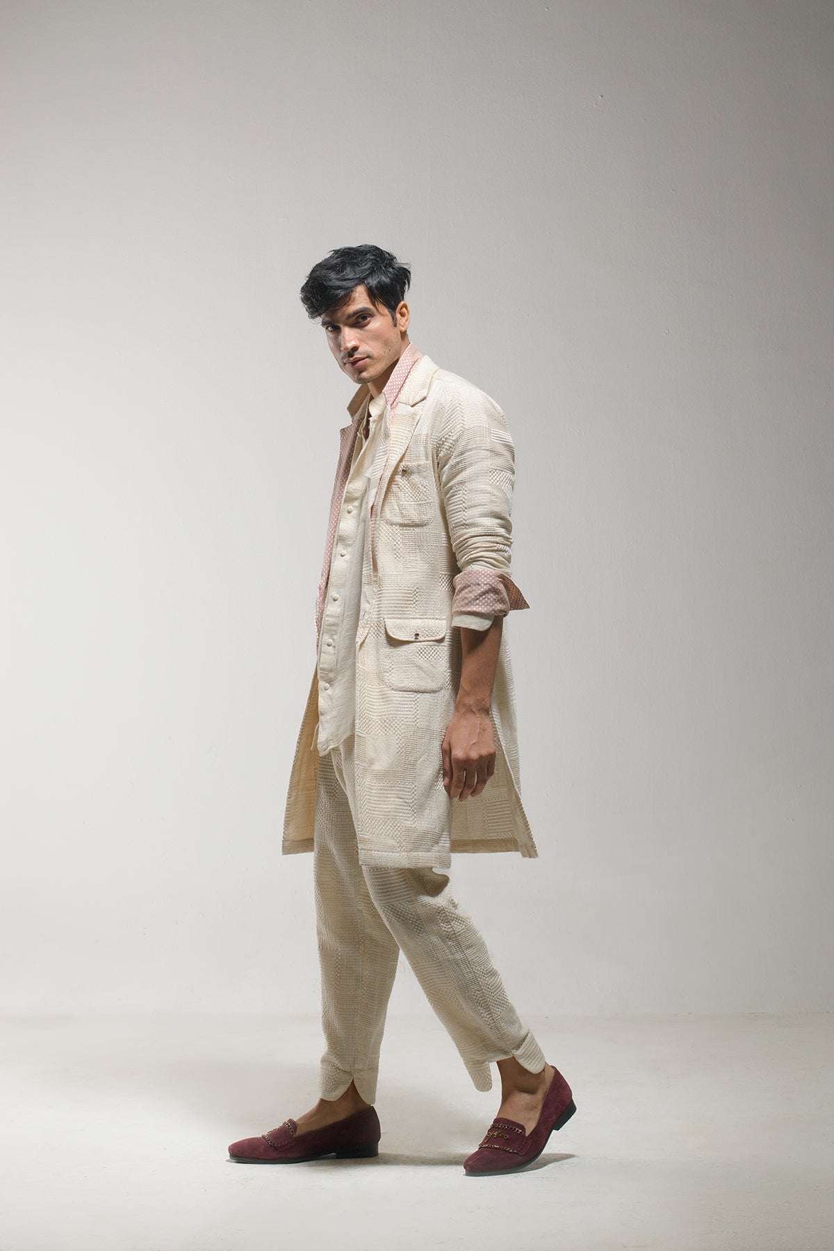 Wrap yourself in sophistication with our Beige Overcoat.