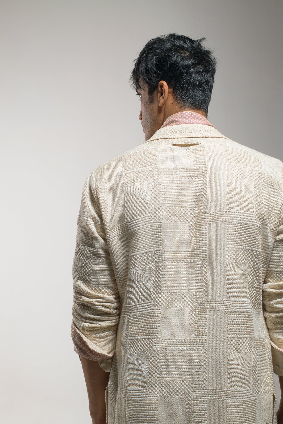 Elevate your outerwear with a touch of beige.