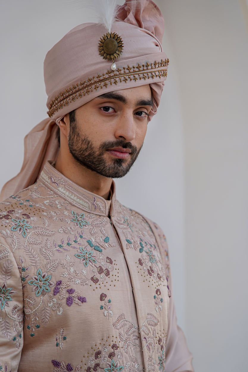 Designed for the modern man, the Blush In JMC sherwani offers a contemporary twist on a classic look.