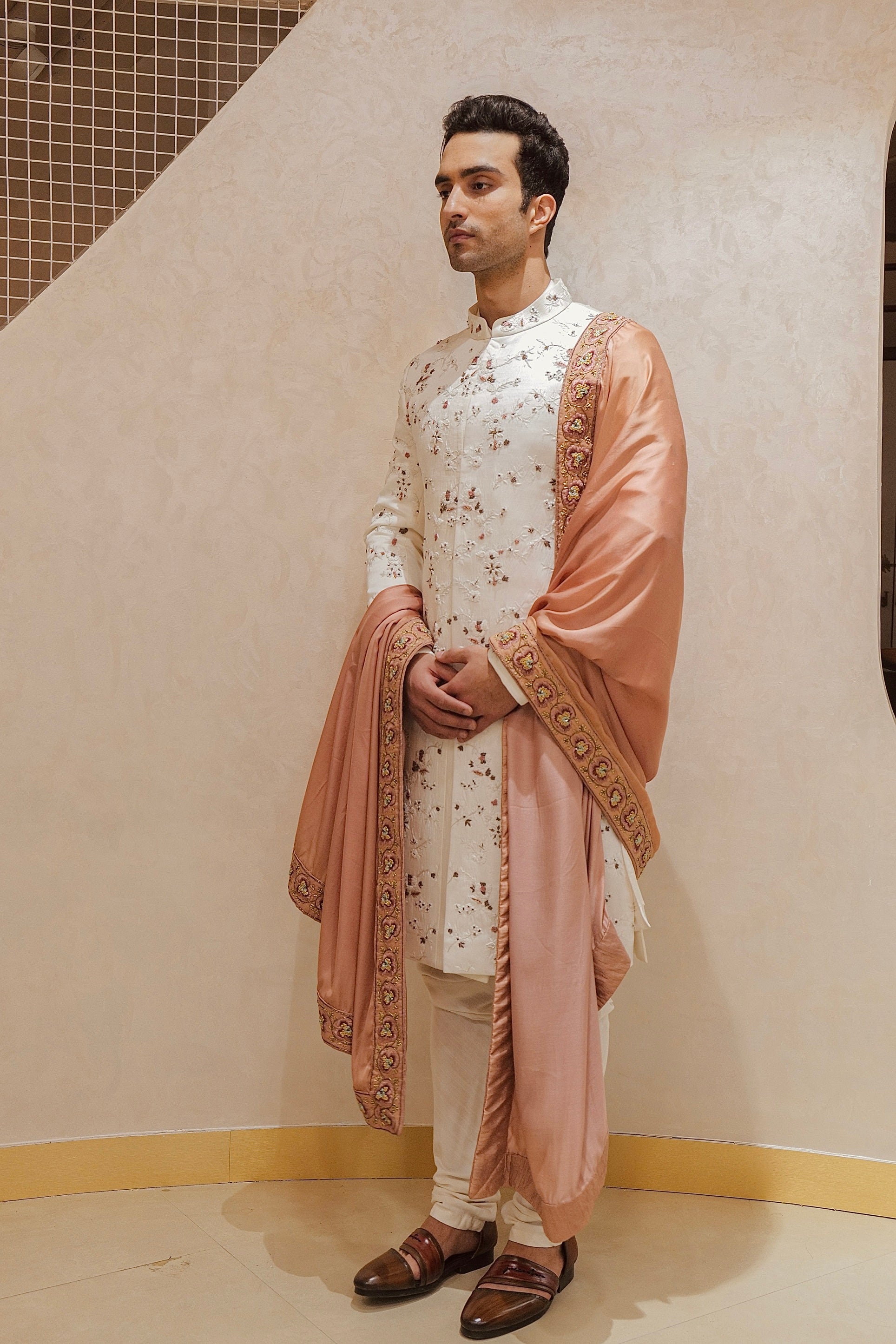 The Regal White Sherwani Set: Commanding attention with majestic elegance.