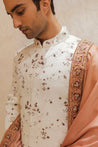 The Regal White Sherwani Set: Exuding opulence and sophistication in every detail.