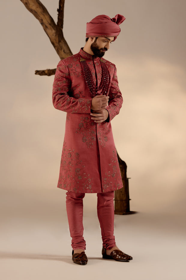 Full view of the Red Ochre Sherwani on a mannequin, highlighting its refined and regal silhouette.