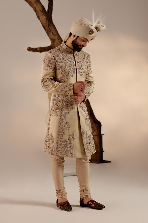 Side profile of the Sand Ridge Sherwani, displaying the luxurious fabric and subtle texture