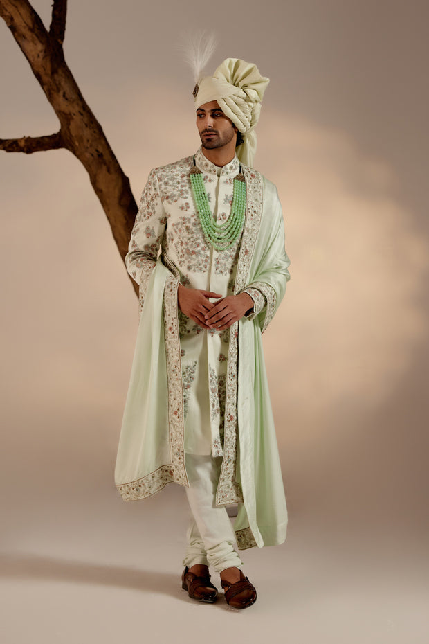 Full view of The Elegant Groom Sherwani on a mannequin, highlighting its regal and polished