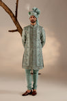 Model showcasing the Chateau Bloom Sherwani, radiating elegance with its floral-inspired design.