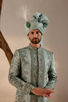 Close-up of the Chateau Bloom Sherwani, revealing intricate floral embroidery and fine detailing