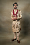 Front view of the Frosted Almond Sherwani, blending traditional craftsmanship with contemporary elegance