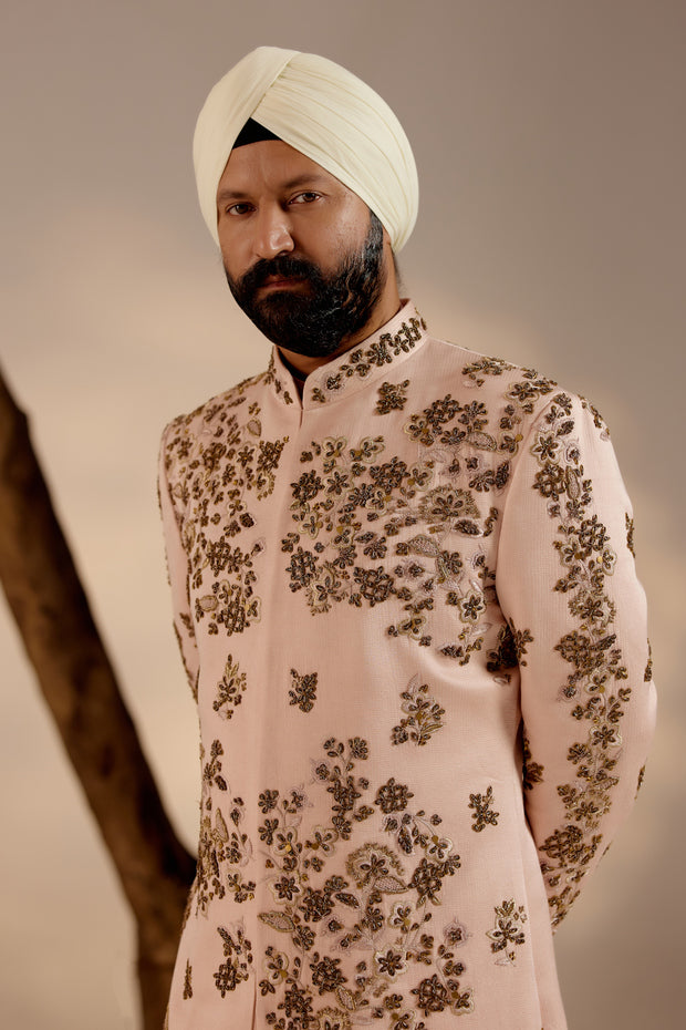 Side profile of the Frosted Almond Sherwani, displaying the luxurious fabric and subtle texture."