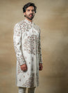 Side profile of the Opaline Sherwani, displaying the luxurious fabric and subtle shimmer.