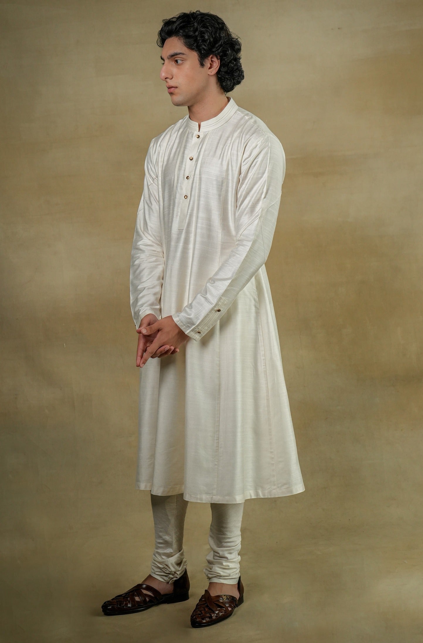 Side profile of the Gardenia White Sherwani, displaying the luxurious fabric and subtle texture