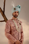 Side profile of the Orchid Pink Sherwani, displaying the luxurious fabric and subtle sheen