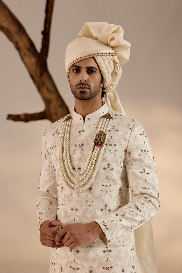 Close-up of the Rouge Wane Sherwani, revealing intricate embroidery and fine detailing