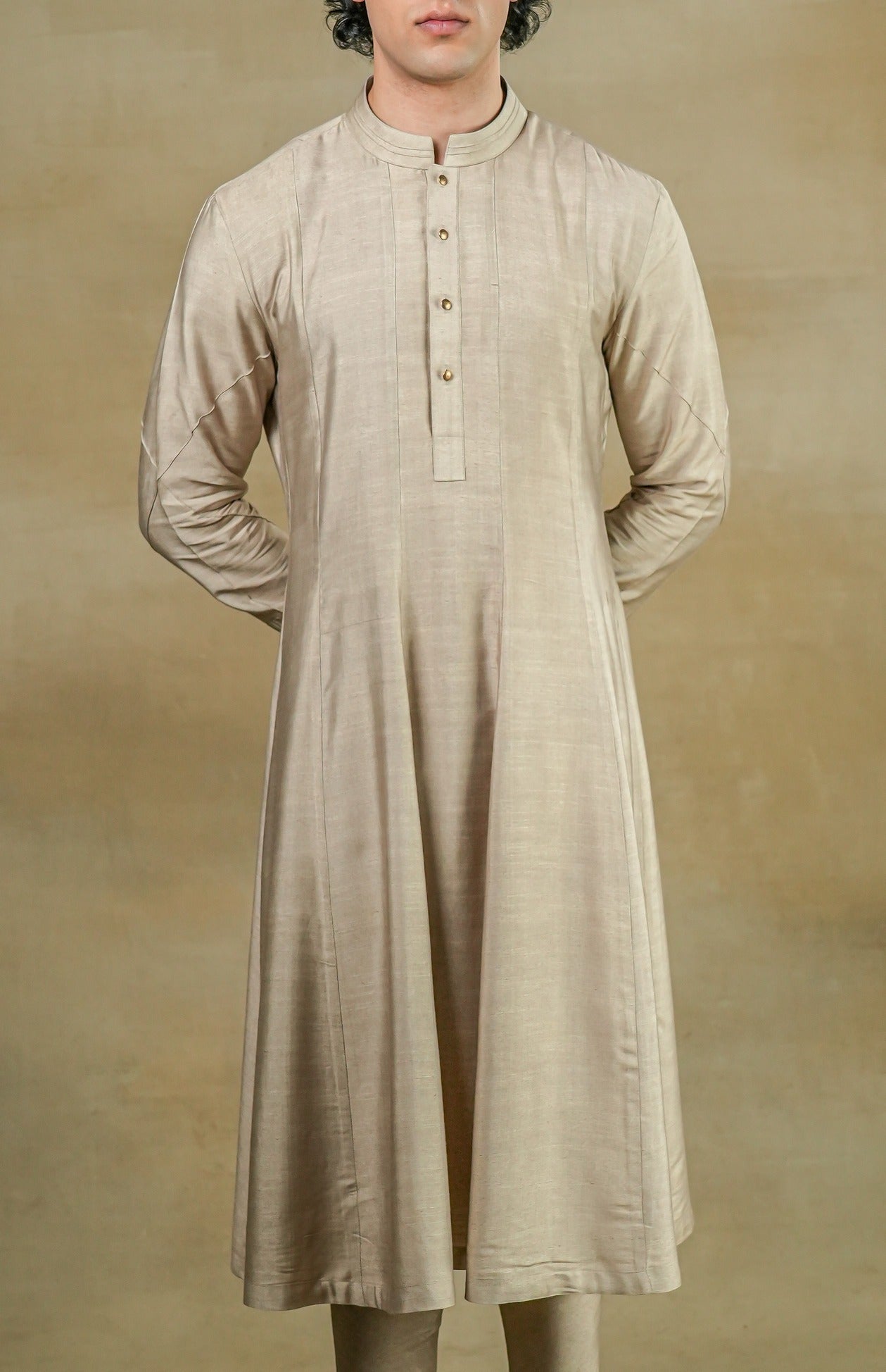 Introducing our elegant sand grey cotton silk Anarkali kurta, crafted to perfection for a graceful and refined look