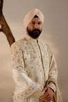 Introducing our exquisite dirty ivory sherwani, a true work of art. 