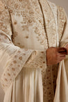 Introducing our exquisite dirty ivory sherwani, a true work of art. 