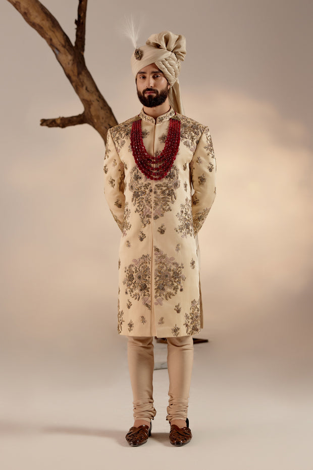 Introducing our masterpiece: the golden placement hand-embroidered sherwani. 