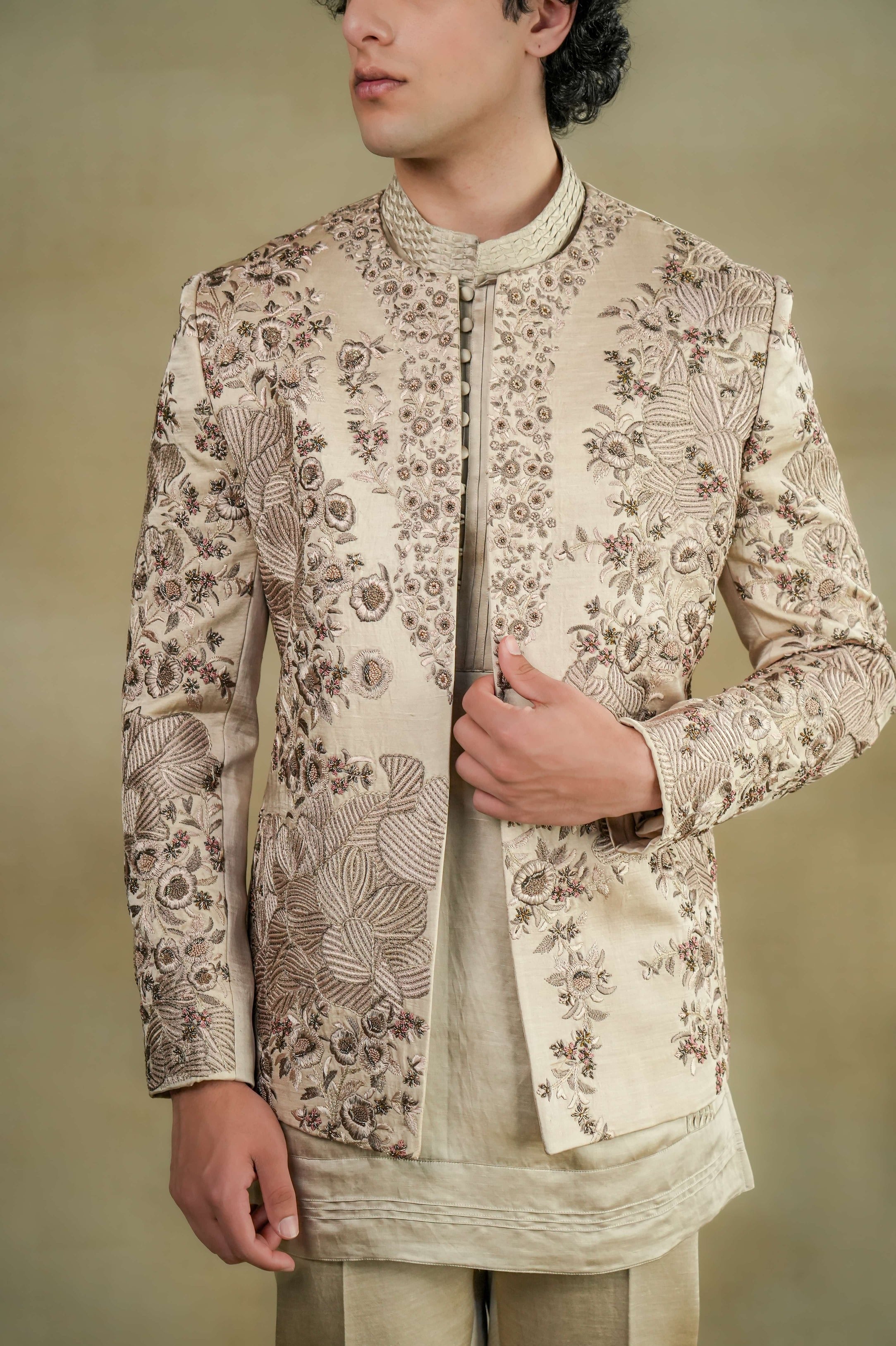  sand grey short jacket, adorned with exquisite hand-embroidery details for a touch of sophistication and style. 