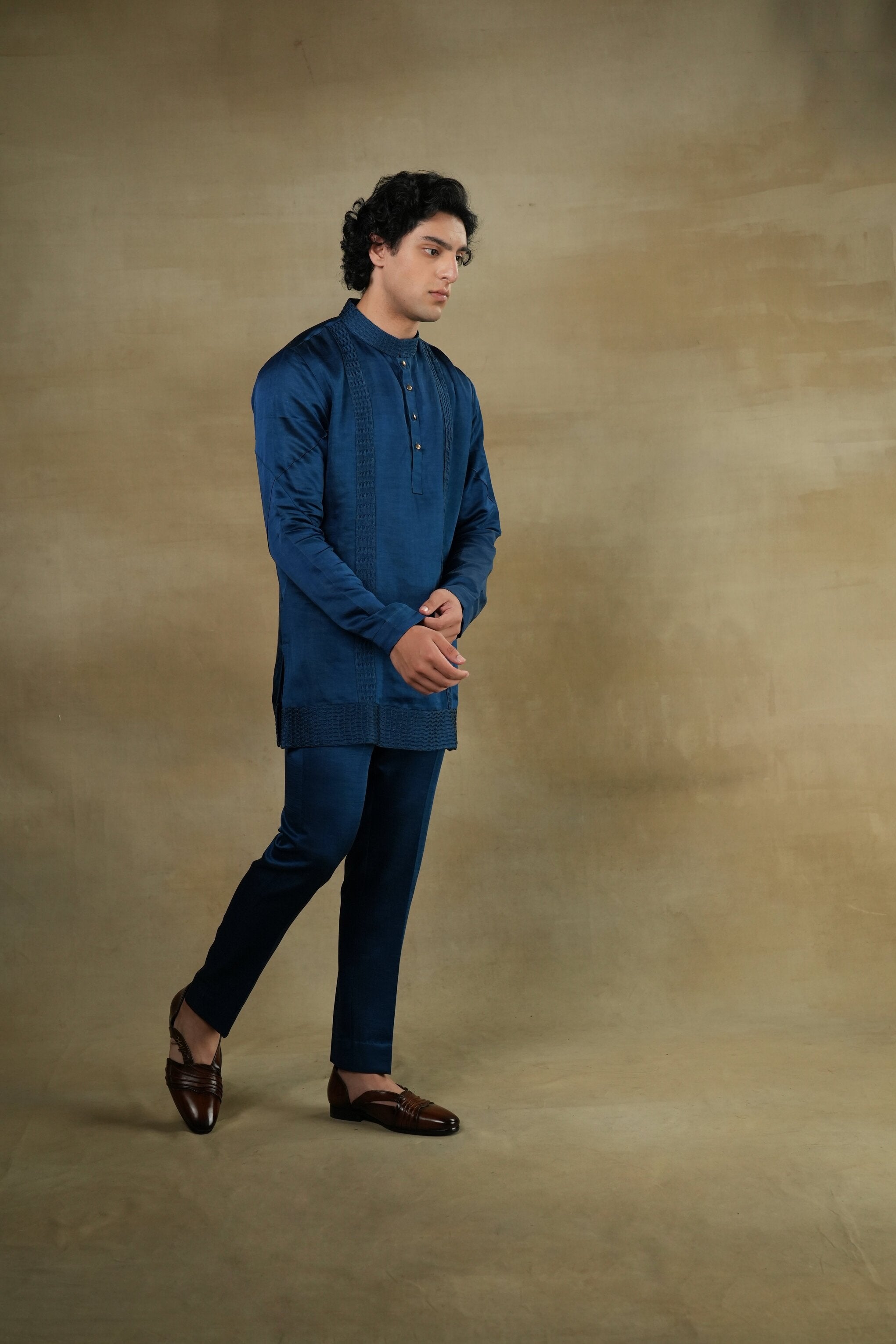 Teal Blue Linen Silk short-length kurta, crafted to make a statement with its vibrant hue and intricate detailing